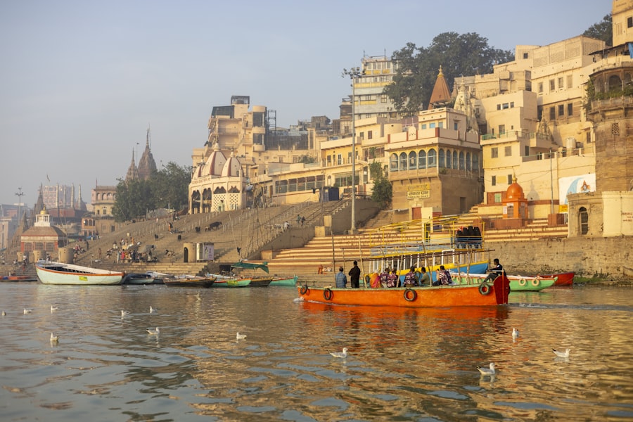 The ghats of Varanasi rising above the Ganga in morning haze