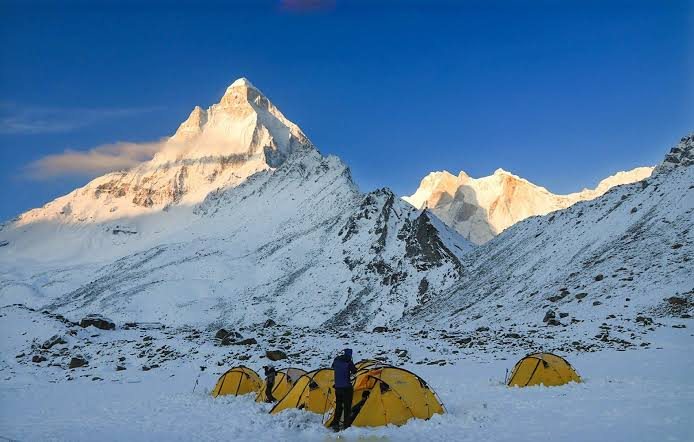 Snow peaks above a high trekking camp on the Gangotri route to Gaumukh