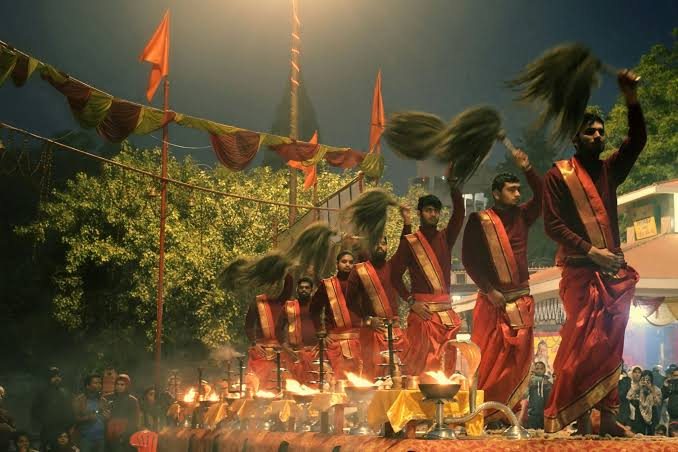 Priests performing the dawn aarti on the Varanasi ghats