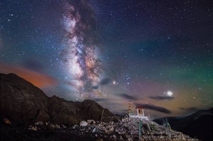 The Milky Way arching over a high ridge in Spiti